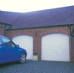 Roller shutter garage doors in arched openings