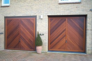 Pair of Hormann chevron cedarwood timber garage doors in Titchmarsh, Northants