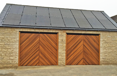 Two Single Up and Over Garage Doors in Chevron Design