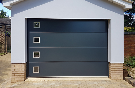 Stainless steel square windows on Anthracite door
